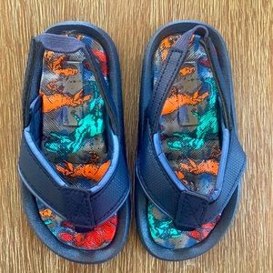 Dinosaur flip flops
